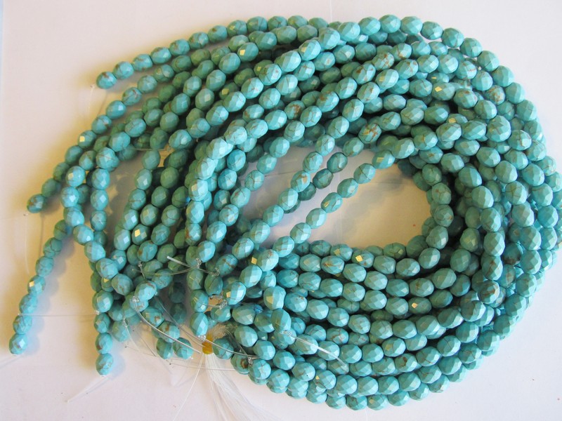 (image for) Turquoise glass faceted barrel beads #1588